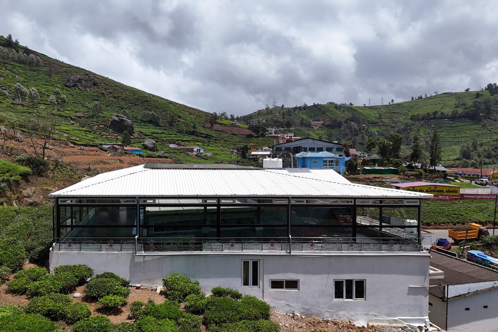 Aerial view of the banquet pavilion on its own terrace below the tea slopes